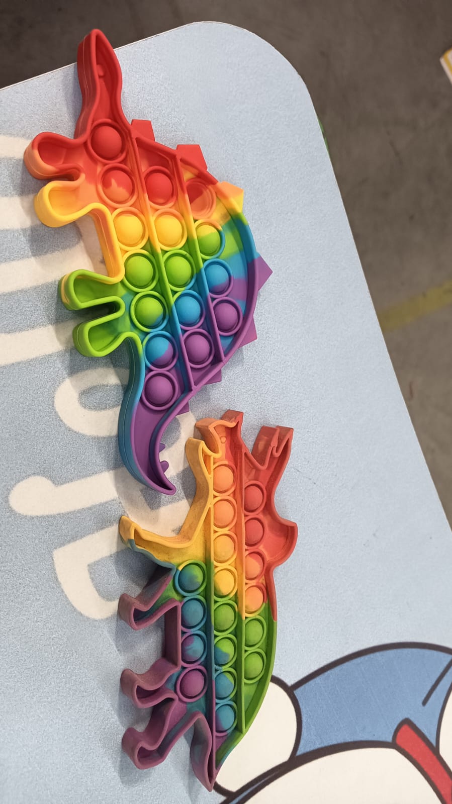 Vibrant rainbow push  bubble toy for interactive fun